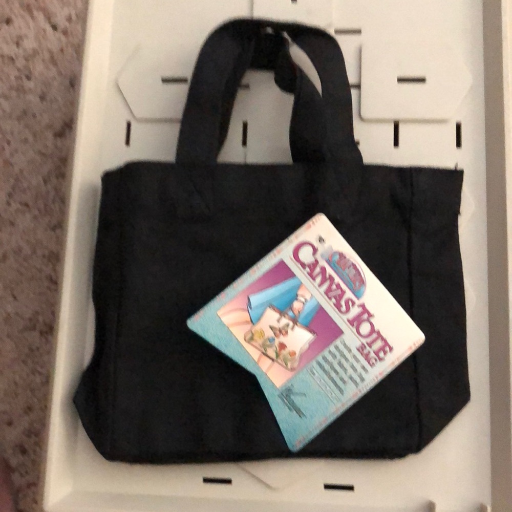 NWT black canvas tote bag.